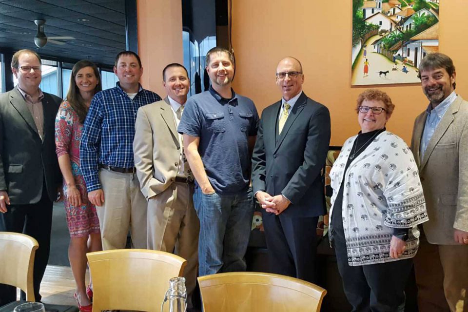 Kosciusko Leadership Academy group photo of eight adults.